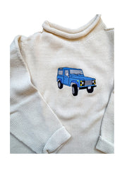 A Soft Idea Roll Neck Sweater in Natural with Land Rover