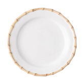 The Juliska Bamboo Dinnerware is a white ceramic plate with a raised rim styled like light brown bamboo stalks, shown from above on a white background.