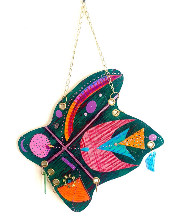 The artwork 'Quartet' features a vibrant butterfly design painted in acrylic on paper, showcasing bold geometric patterns in teal, pink, orange, and purple. The abstract butterfly shape incorporates textured segments, dotted details, and metallic chain embellishments, creating a playful and modern interpretation at 16x12 inches by Sunny Chapman.