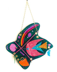 The artwork 'Quartet' features a vibrant butterfly design painted in acrylic on paper, showcasing bold geometric patterns in teal, pink, orange, and purple. The abstract butterfly shape incorporates textured segments, dotted details, and metallic chain embellishments, creating a playful and modern interpretation at 16x12 inches by Sunny Chapman.