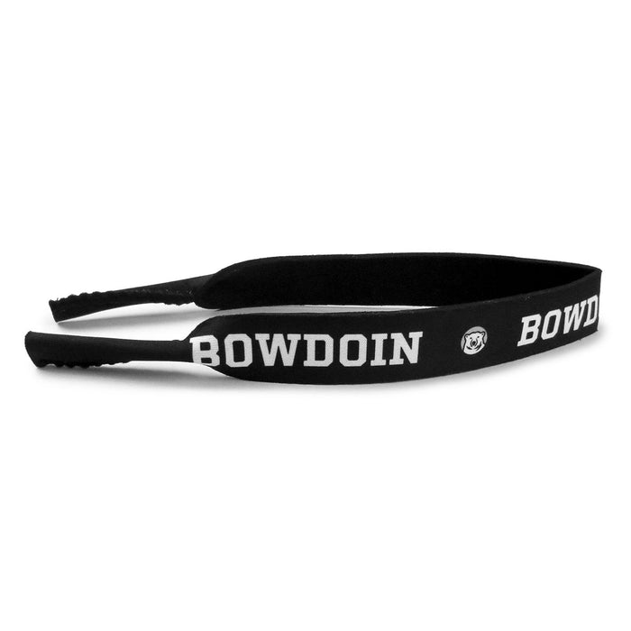 Black neoprene sunglass strap with sublimated imprint of BOWDOIN and mascot medallion repeating.