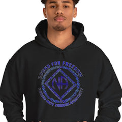 Person wearing a black hoodie with a blue logo on a white background