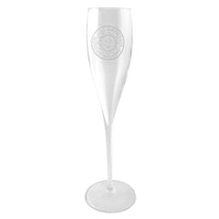 Crystal champagne flute with engraved Bowdoin sun seal.