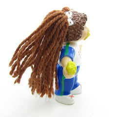 Cabbage Patch Kids miniature figurine with brown yarn hair and I Love You t-shirt