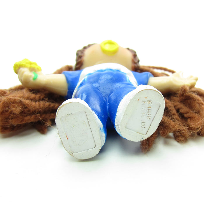 Cabbage Patch Kids miniature figurine with brown yarn hair and I Love You t-shirt