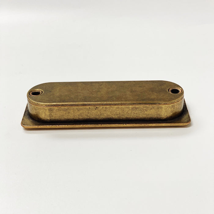 Forme Recessed Cabinet and Closet Pulls in Antique Brass Finish — form, finish and mounting detail