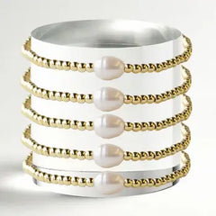 gold beaded bracelet with pearl