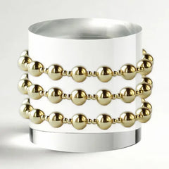 gold beaded bracelet stack