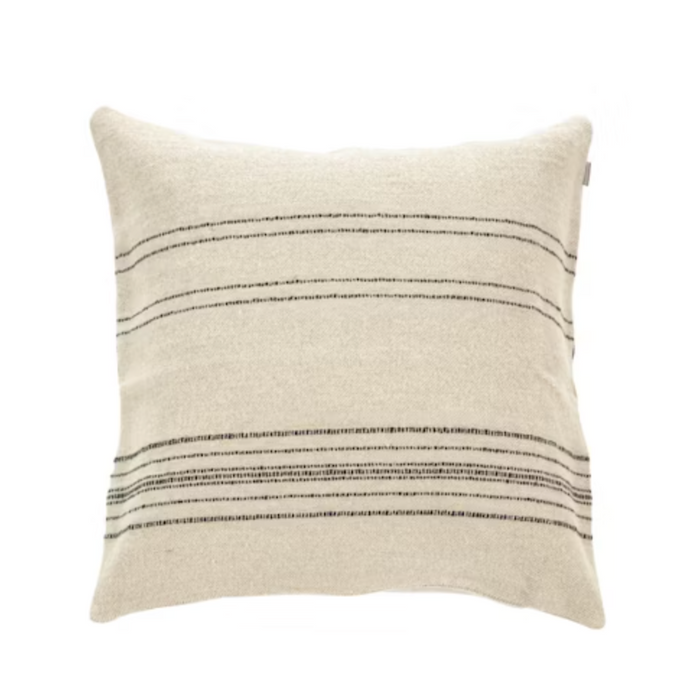 The Moroccan Stripe Pillow by Libeco Home features a square beige design with thin, evenly spaced horizontal black stripes, resembling a classic Moroccan coverlet, shown on a white background.