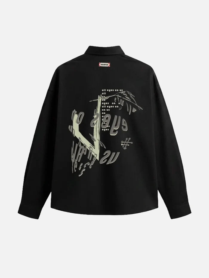SEVDRUS Note Shirt – siyah, arka baskılı grafik ve arka üstteki küçük etiket görünümü