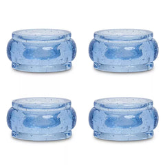 Four round blue glass Provence Napkin Ring Set/4 with a bubbled texture, perfect for colorful table decor.