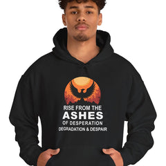 Person wearing a black hoodie with a motivational quote and graphic design on a white background