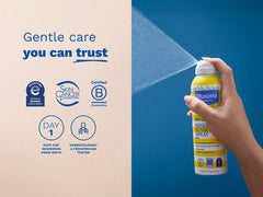 Mustela USA | Hand spraying Mustela SPF 50 Mineral Sunscreen Spray against a blue background. Text: Gentle care you can trust. Certified by National Eczema Association, Skin Cancer Foundation, and B Corporation. Safe for newborns from birth, dermatologist and pediatrician tested