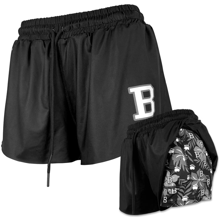 Two views of black shorts with a letter 'B' logo, one showing a liner with a black, white, and grey Hawaiian print with incorporated repeating B and paw print motif.